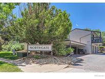 Welcome to Northgate; this condo features mature landscaping, a carport, and a welcoming facade at 3295 34Th St # 62, Boulder, CO 80301