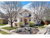 Charming home with landscaped front yard and inviting entrance and classic architectural details at 4027 Guadeloupe St, Boulder, CO 80301
