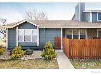 Charming home featuring a small wooden fence, a small garden, and stone accents at 3823 Paseo Del Prado, Boulder, CO 80301