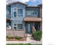 Charming townhome with a well-kept lawn and front porch entrance at 4150 Longview Ln, Boulder, CO 80301