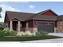 Inviting single-Gathering home showcasing a red exterior, stone accents, well-manicured landscaping, and an attached two-car garage at 900 W 128Th Pl, Westminster, CO 80234