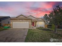 Charming single-Gathering home with stone accents, a red front door, and a well-maintained lawn at 13960 Grape St, Thornton, CO 80602