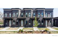 Stylish townhome exteriors feature dark brick, modern windows, and professionally landscaped front yards at 859 30Th St, Denver, CO 80205