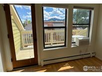 Inviting view of the balcony from the windows, with mountain scenery enhancing this charming space at 3025 Broadway St # 17, Boulder, CO 80304