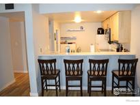 Bright kitchen features bar seating and ample cabinet space at 805 29Th St # 157, Boulder, CO 80303