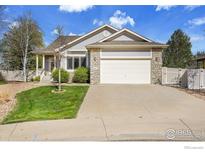 Charming single-Gathering home featuring stone accents and a two-car garage at 9960 Bountiful St, Firestone, CO 80504