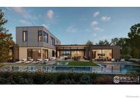 Modern home featuring an inviting outdoor pool, lounge chairs, and expansive glass doors at 855 Kalmia Ave, Boulder, CO 80304