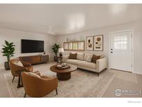 Bright living room features neutral tones, modern furnishings, ceiling fan, and ample natural light at 10249 W Grand Ave, Littleton, CO 80127