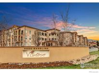 Beautiful exterior view of the Vistoso condos in Boulder with mountain views at sunset at 4500 Baseline Rd # 3203, Boulder, CO 80303