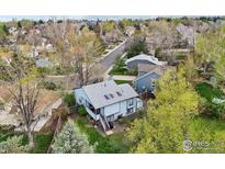 Charming home with skylights and updated roof nestled in a tree-lined neighborhood at 13755 W 65Th Dr, Arvada, CO 80004