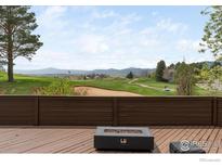 Enjoy panoramic golf course views from the deck of this beautiful home at 4046 Niblick Dr, Longmont, CO 80503