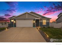 Charming single-Gathering home featuring a two-car garage, well-manicured lawn and professional landscaping at 525 Bonneville Ave, Fort Lupton, CO 80621