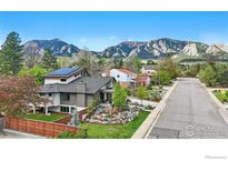 Beautiful home showcasing professionally landscaped yard and Flatirons mountain views in Boulder, Colorado at 2790 Stanford Ave, Boulder, CO 80305