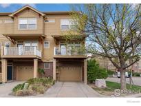 Inviting townhome featuring attached garages and private balconies, perfect for relaxing or entertaining outdoors at 12820 King St, Broomfield, CO 80020