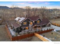 Stunning two-story home with modern design, stone accents, a three-car garage and solar panels at 313 S 3Rd Ave, Superior, CO 80027