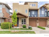 Charming two-story home boasting modern architecture, lush landscaping, and a welcoming covered entry at 3714 Ridgeway St, Boulder, CO 80301