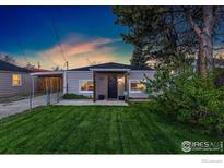 Charming single story home featuring a tidy front lawn, craftsman accents, and welcoming front porch at 109 S Fulton Ave, Fort Lupton, CO 80621