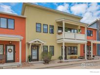 Attractive multi-story townhouse with private balcony, cheerful exterior, and appealing architectural details at 3174 Foundry Pl, Boulder, CO 80301
