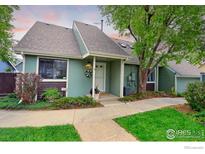 Charming home featuring a well-maintained lawn and welcoming front entrance at 4877 Darwin Ct, Boulder, CO 80301
