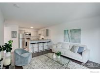 Bright living room featuring modern furnishings and an open floor plan at 5120 Williams Fork Trl # 210, Boulder, CO 80301
