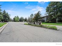 Welcome to Cottonwood Park, a picturesque community with lush greenery and a tranquil atmosphere on a sunny day at 8050 Niwot Rd # 37, Niwot, CO 80503