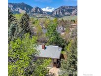 Charming home nestled amidst lush greenery, boasting mountain views and a serene neighborhood setting at 1245 Claremont Dr, Boulder, CO 80305