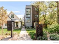 Modern townhomes with striking architecture, landscaped yards, and well-maintained walkways at 1838 22Nd St, Boulder, CO 80302