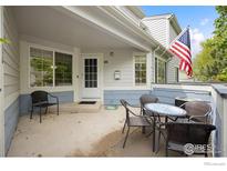 Outdoor patio with seating offers a relaxing space to enjoy the outdoors, perfect for entertaining at 1419 Red Mountain Dr # 45, Longmont, CO 80504