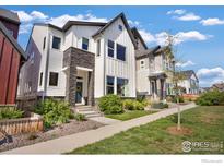 Charming two-story home with modern architectural details and well-maintained landscaping at 1933 W 165Th Way, Broomfield, CO 80023
