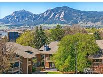 Condos with views of the Flatirons and mature landscaping at 2800 Kalmia Ave # C203, Boulder, CO 80301