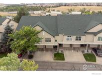 Inviting townhome featuring a well-manicured lawn and private garages at 2092 N Concord Ln, Superior, CO 80027