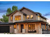 Stunning two-story home featuring stone and wood accents at 2700 15Th St, Boulder, CO 80304