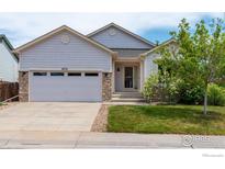 Charming single-Gathering home featuring a two-car garage and well-maintained front yard at 6721 E 114Th Ave, Thornton, CO 80233