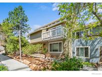 Inviting two-story home features a balcony and a well-maintained, landscaped front yard at 3878 Broadway St # 1, Boulder, CO 80304