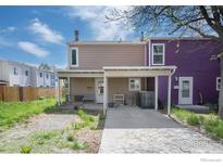 Cozy home featuring covered parking, quaint front patio, and low-maintenance landscaping at 713 Arrow Ct, Lafayette, CO 80026