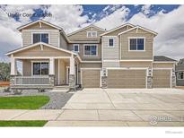 Craftsman-style home with multi-car garage and inviting front porch at 2710 Crystal Springs Ln, Longmont, CO 80503