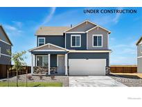 Charming two-story home under construction with a modern design and inviting front porch at 4204 Sandstone Dr, Mead, CO 80504