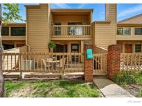Charming townhome featuring a fenced front patio, perfect for enjoying outdoor living and neighborhood views at 5016 Buckingham Rd # 4, Boulder, CO 80301