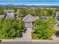 Inviting two-story home with mature trees and mountain views in a desirable neighborhood at 13311 Pearl Cir, Thornton, CO 80241
