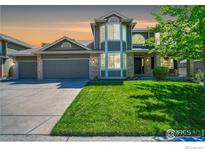Charming two-story home with a well-manicured lawn and a three car garage, located in a desirable neighborhood at 2248 Imperial Ln, Superior, CO 80027