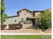 Charming two-story townhouse with a well-maintained front yard and inviting entrance at 3295 Big Horn St, Boulder, CO 80301
