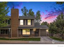Charming two-story home with brick chimney and attached garage in a well-maintained neighborhood, perfect for families at 4116 W 111Th Cir, Westminster, CO 80031