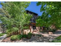 Beautiful two-story home with stone accents and professionally landscaped front yard at 788 Grant Pl, Boulder, CO 80302