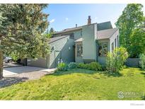 An inviting two-story home with a mature yard and a attached two-car garage at 3470 16Th Cir, Boulder, CO 80304