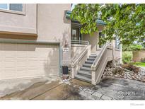 Charming home featuring a private entrance with well-maintained landscaping and an attached two-car garage at 4326 Clay Commons Ct, Boulder, CO 80303