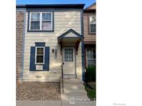 Charming home featuring classic design elements, a covered entryway, and beautiful stone and siding accents at 2929 W 81St Ave # H, Westminster, CO 80031