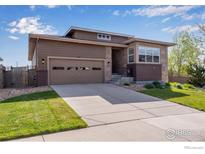 Charming single-Gathering home with a two-car garage and manicured front yard at 4000 Donnington Cir, Castle Rock, CO 80104