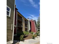 Inviting apartment complex with colorful exteriors and private balconies at 2802 Sundown Ln # 102, Boulder, CO 80303