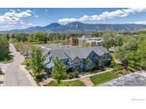 Inviting townhome exterior with attractive landscaping and mountain views at 3671 Pinedale St # D, Boulder, CO 80301