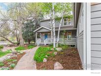 Charming two-story home with a welcoming front porch and well-maintained landscaped yard at 4157 19Th St, Boulder, CO 80304